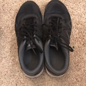 Black Nike gym shoes